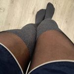 Crossdresser posing sexy in black tights